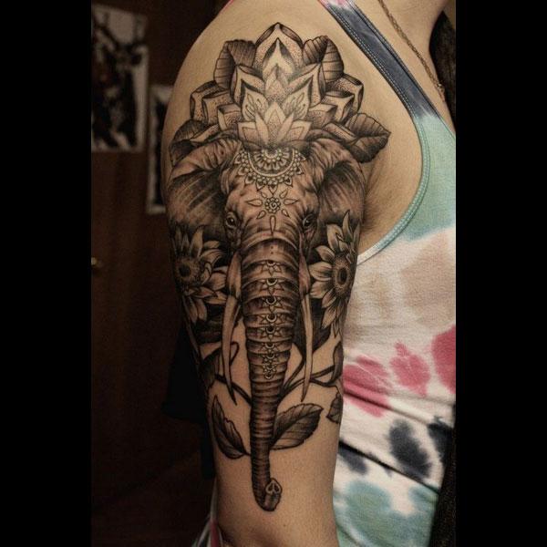 elephant tattoo on arm