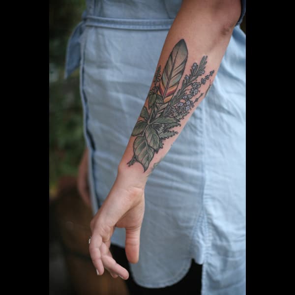 feather arm tattoo