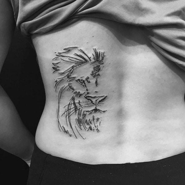 lion tattoo on back