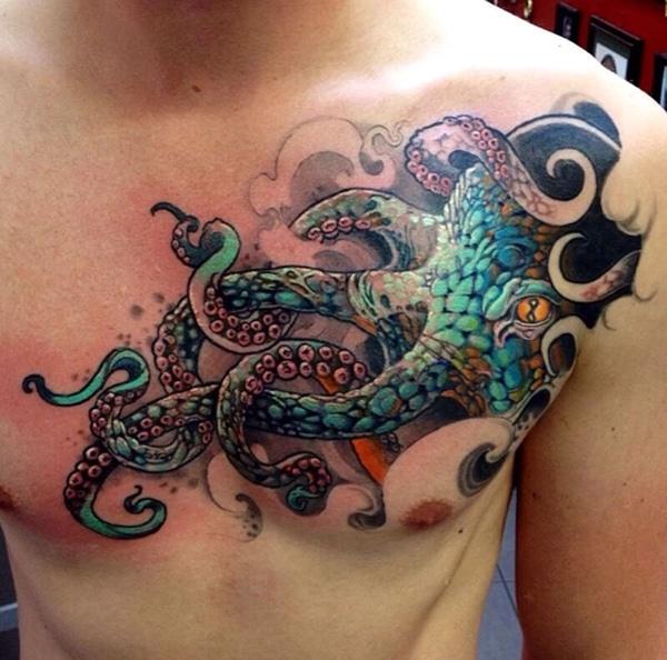 man's tattoo on chest