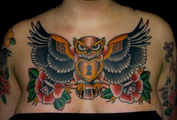 owl tattoo on girl chest