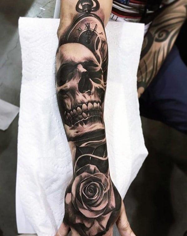 skull hand tattoos