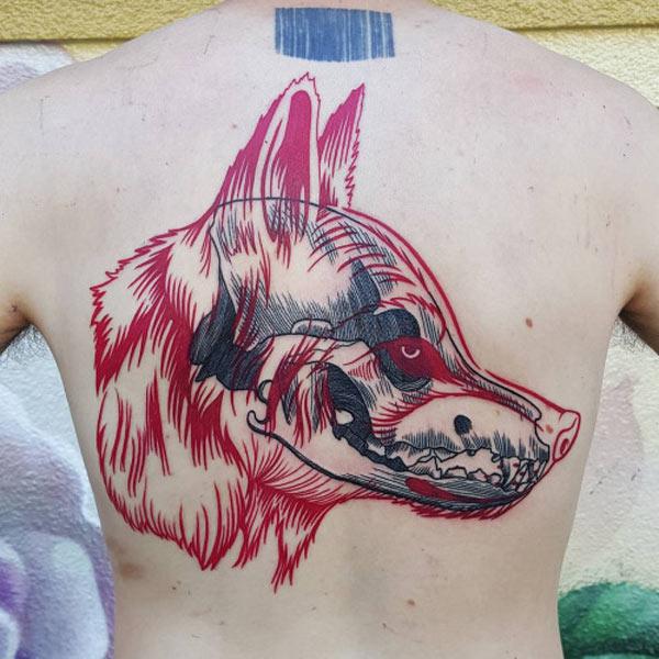wolf tattoo on back