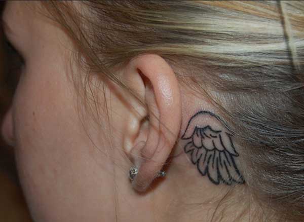 Lovely behind the ear tattoos