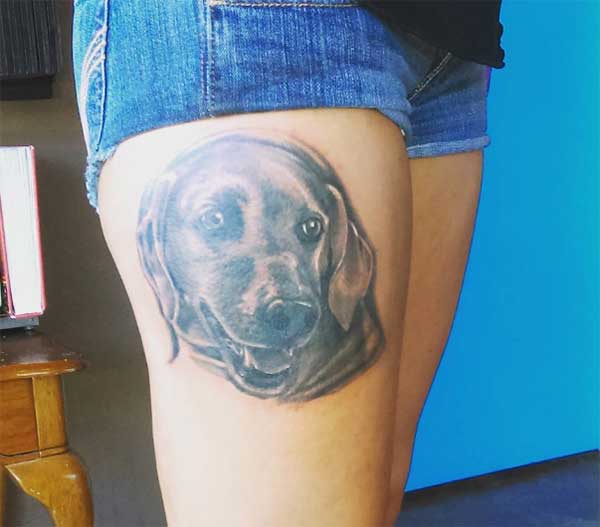 thigh dog tattoos