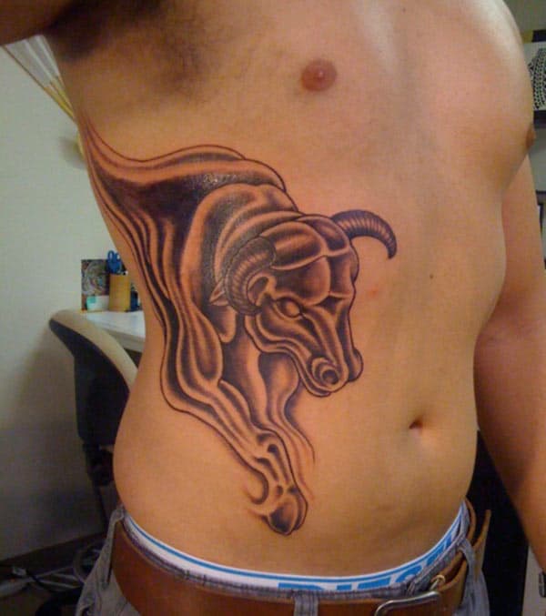 red bull Taurus tattoo on side of abdomen for men