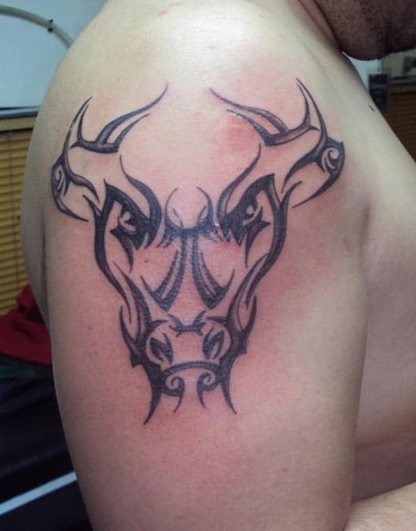 designer simple Taurus tattoo on upper arm for muscular boys