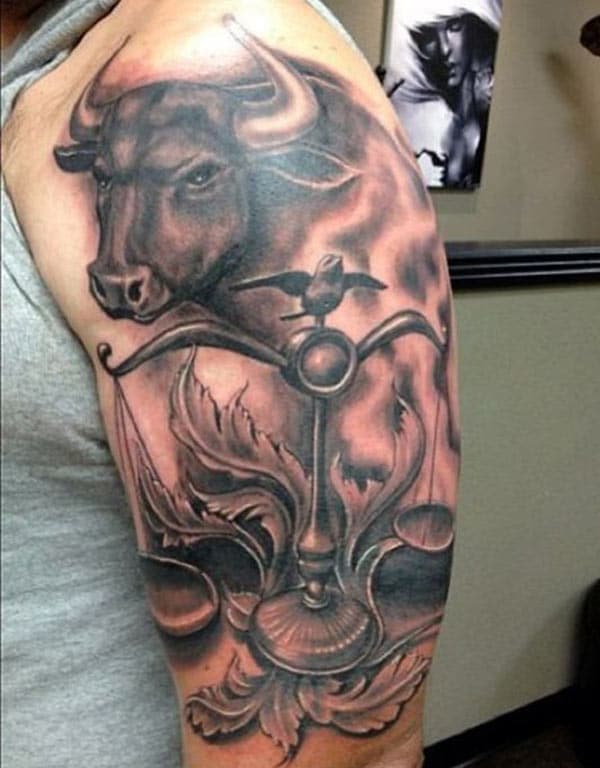 boys bring the masculine look with extensive black Taurus tattoo