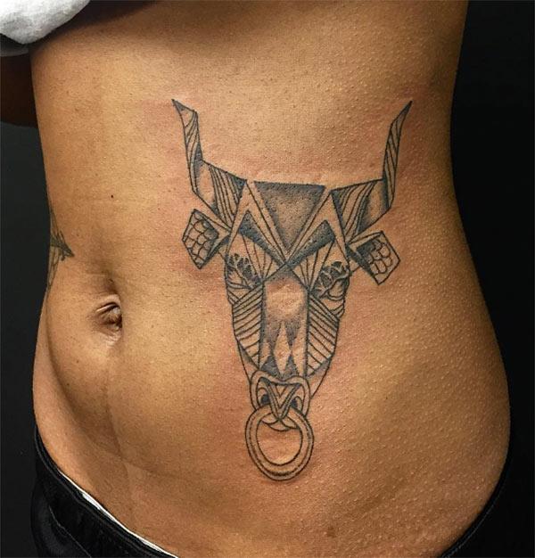 stylish Taurus tattoo on lower body shows a style factor