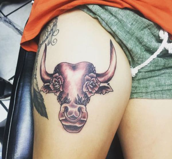Girls go crazy with this unique Taurus tattoo on upper leg