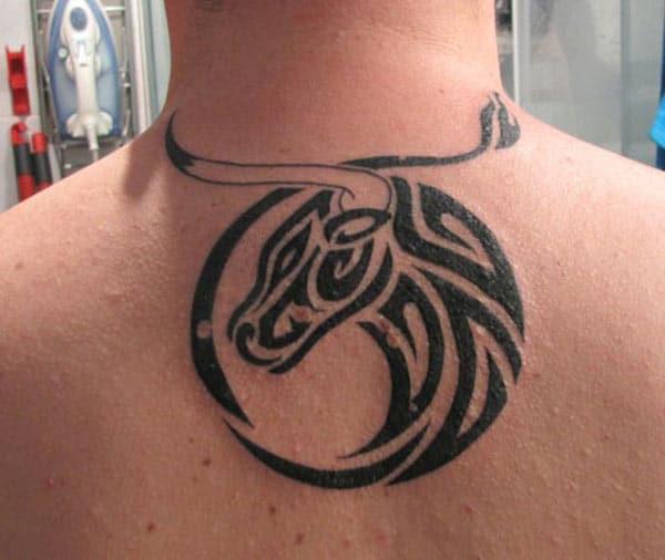 round Taurus tattoo on neck region for an attractive look