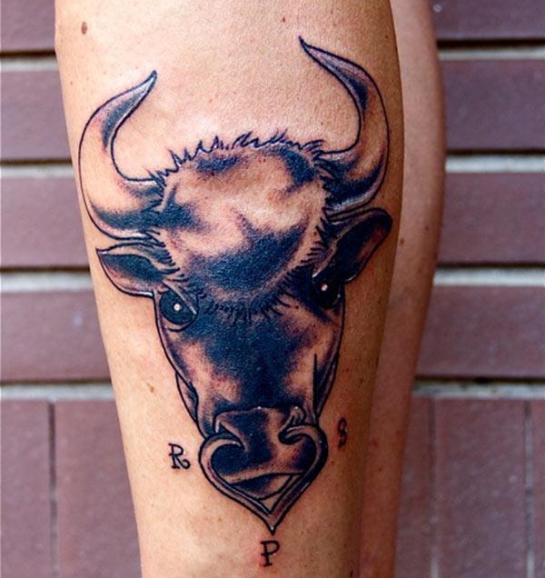blue-colored Taurus tattoo is a sign of power for boys