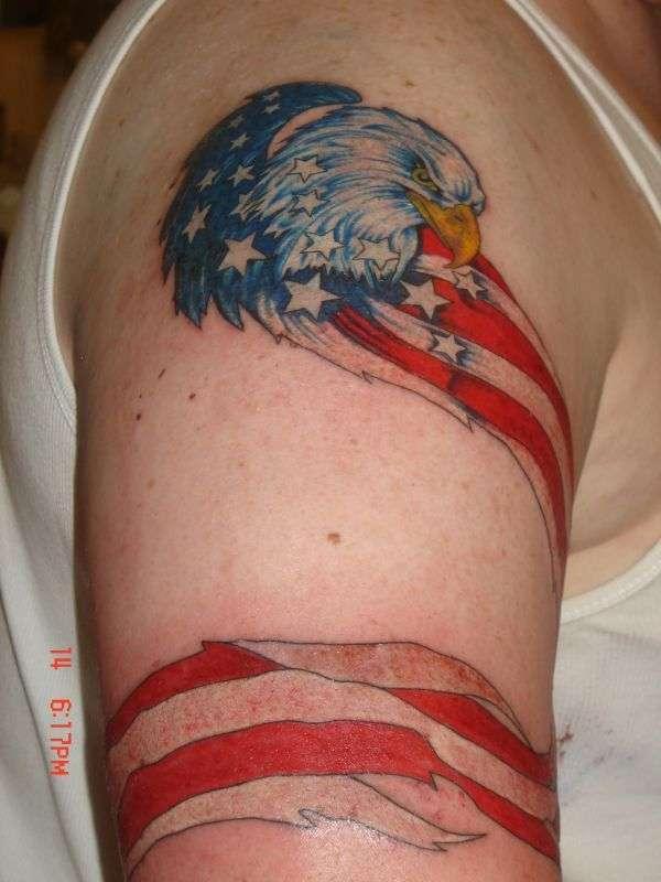 American Flag Tattoo with an eagle ink design, on the right upper arm brings the spruce appearance in men