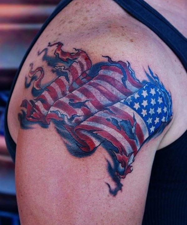 The American Flag Tattoo on the shoulder make a man look hypnotic 