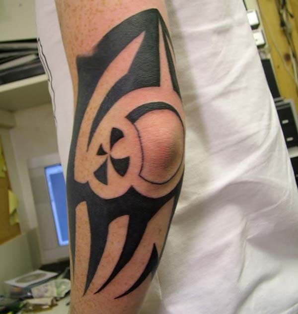 cool tribal elbow tattoo design idea for men