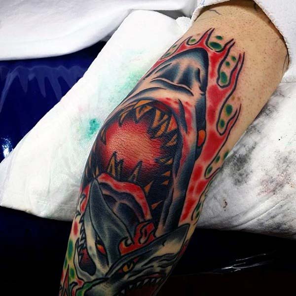shark tattoo design idea on elbow