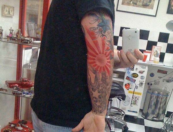 cool Japanese tattoo for men on the elbow