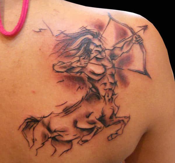 The big and bold Sagittarius tattoo on back speaks everything