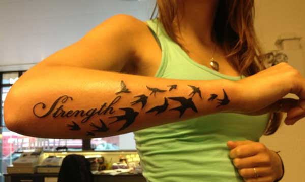 girl strength tattoos