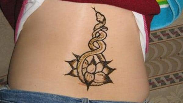 Lower back Mehndi tattoo designs idea