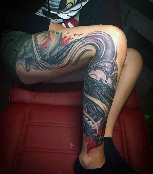 A classic full leg tattoo design for Women
