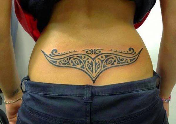 A captivating lower back tattoo design for Girls and women