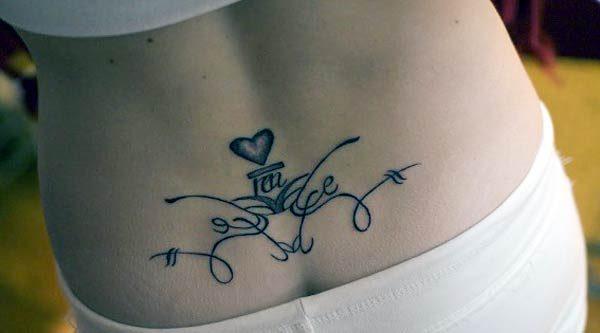 An elegant lower back tattoo idea for Ladies