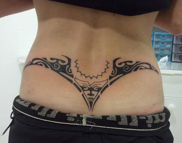 A sexy lower back tattoo design for girls