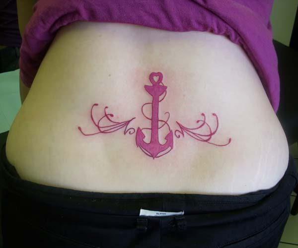 A pretty lower back tattoo idea for Girls and women