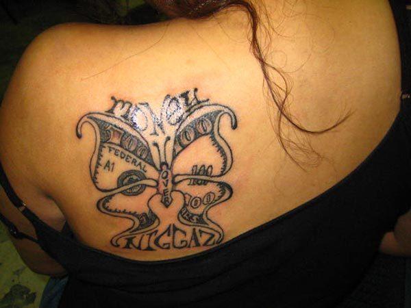 Creativity at its best is seen in this money tattoo for women