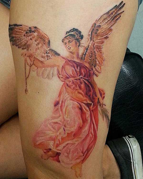 angel tattoo on thigh