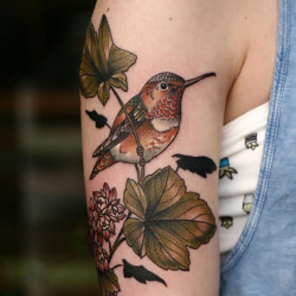 bird tattoo on arm