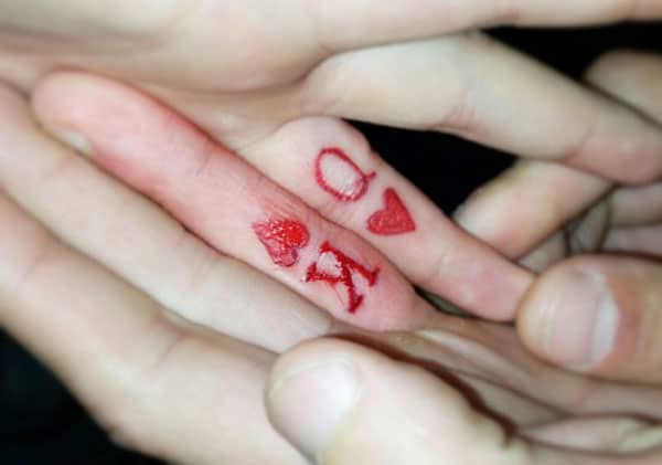 couple finger tattoos