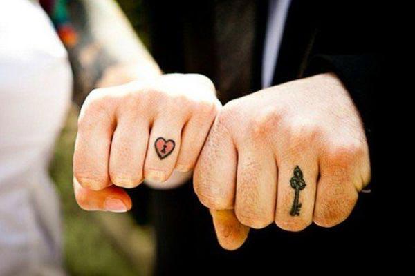 couple finger tattoos