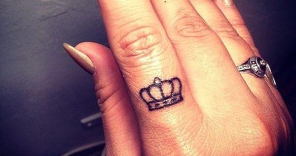 crown tattoos on finger