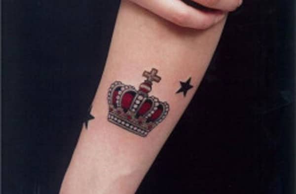 crown tattoos on forearm