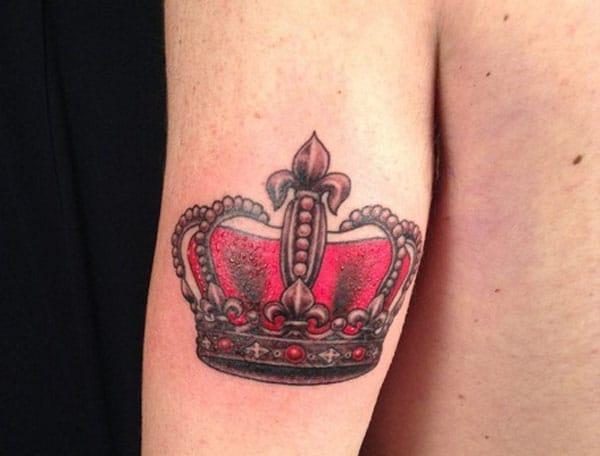 crown tattoo on arm