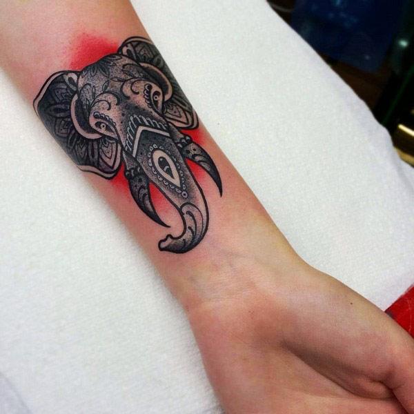 elephant wrist tattoo