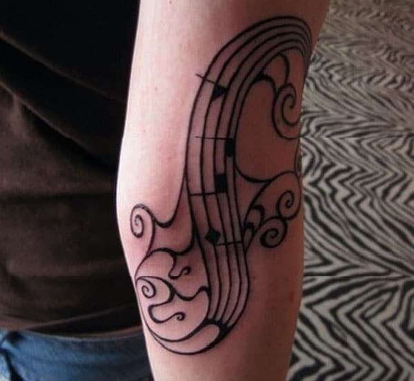music tattoos on elbow