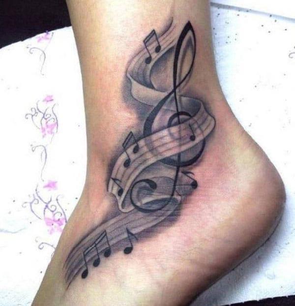 music tattoo on ankle