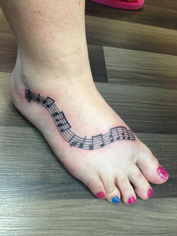 leg music note tattoos