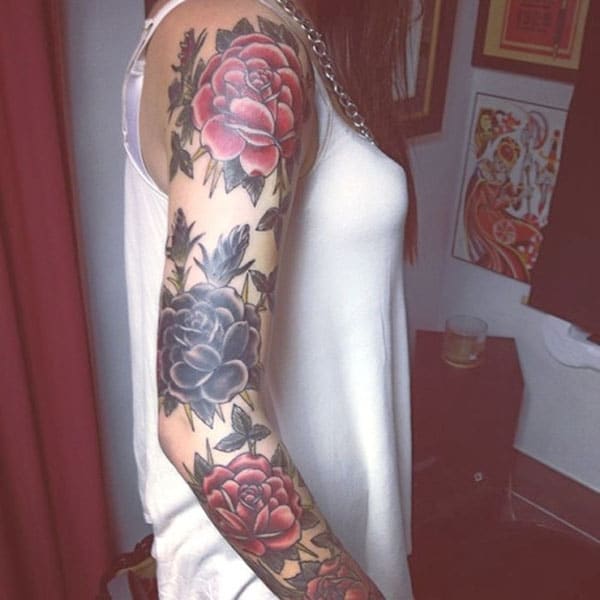 rose tattoo on arm