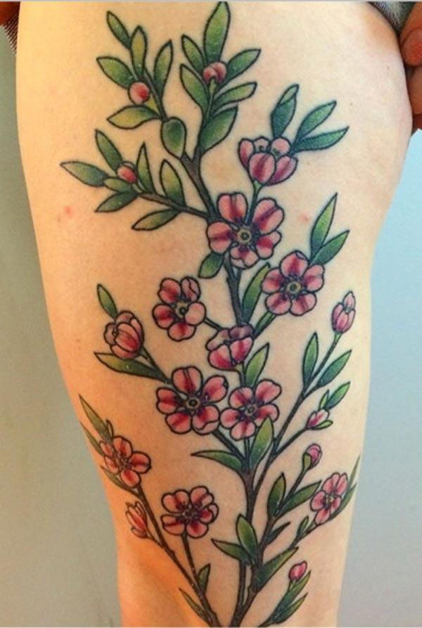 cherry blossom thigh tattoo