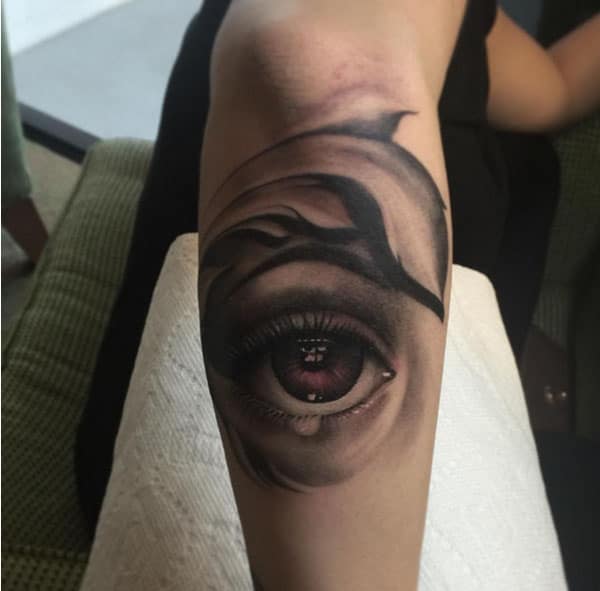 hand eye tattoo