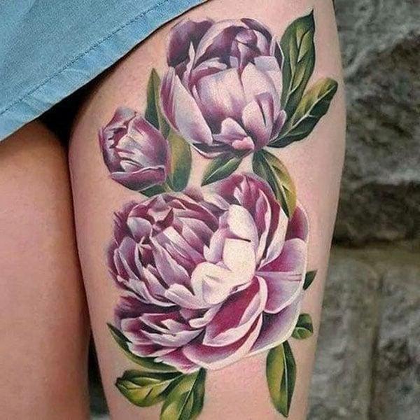 flower tattoos on thigh