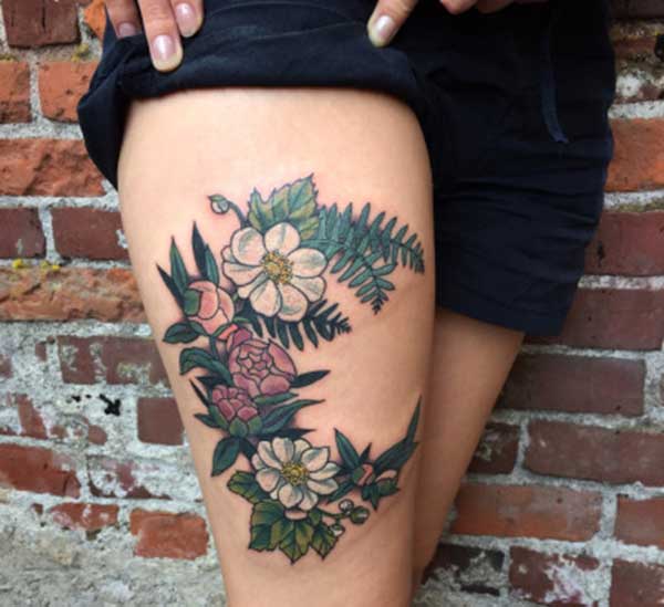 thigh flower tattoos