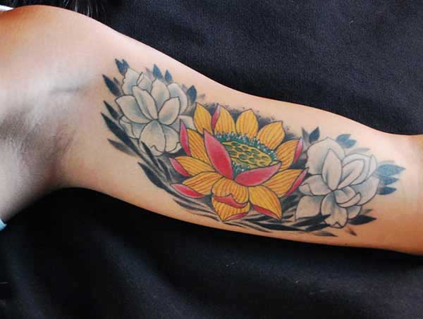 ladies lotus flower tattoos