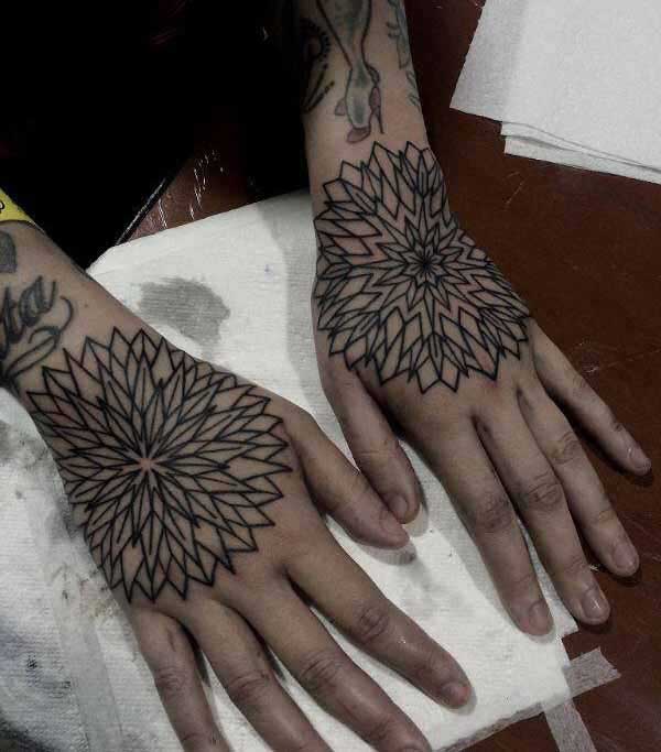 hand mandala tattoos