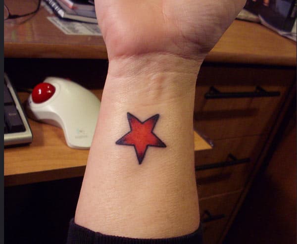 star tattoo on wrist