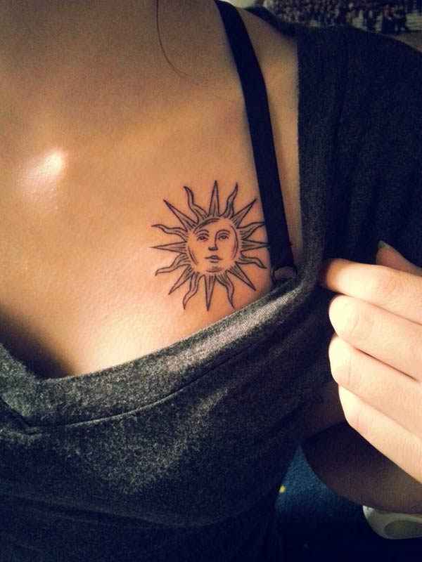 sun tattoo on chest